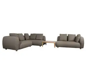 Taupe hjørnesofa med bord, flere sektioner, ryghynder og armlæn. Fleksibel opsætning.